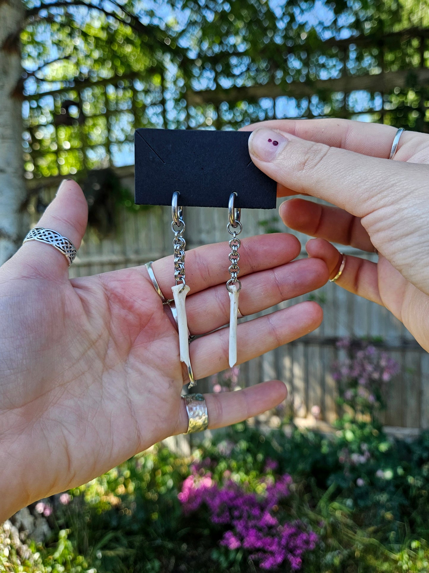 Bird bone earrings with steel chain mail