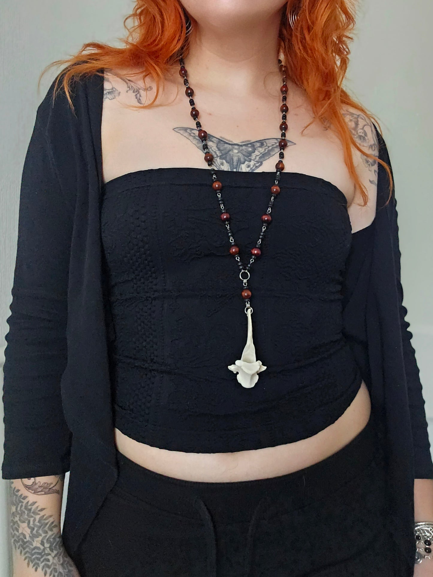 Long wooden necklace with deer vertebrae