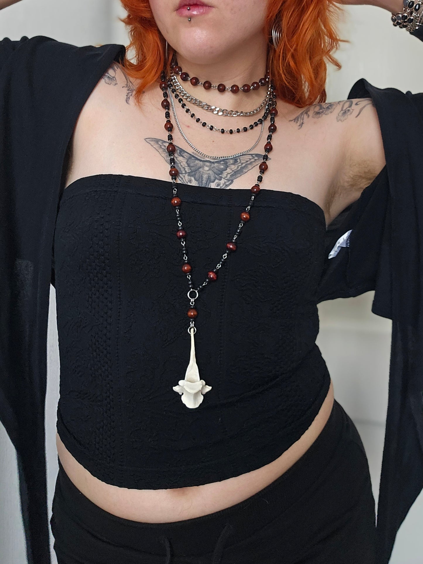 Long wooden necklace with deer vertebrae